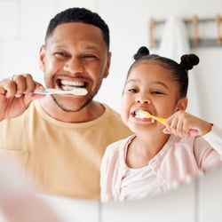 1 - Father & daughter brushing