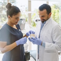 2 - Staffer & dentist discussing