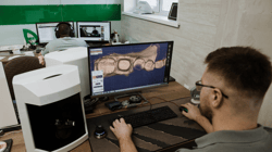 dental technician on computer