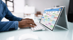 office manager using dental scheduling software