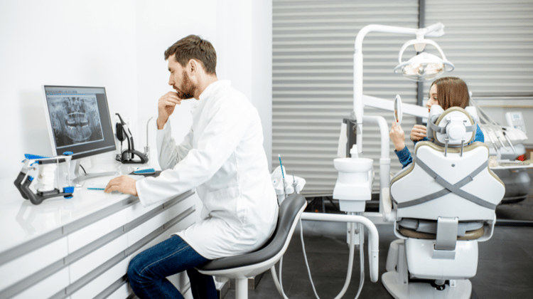 dentist on computer