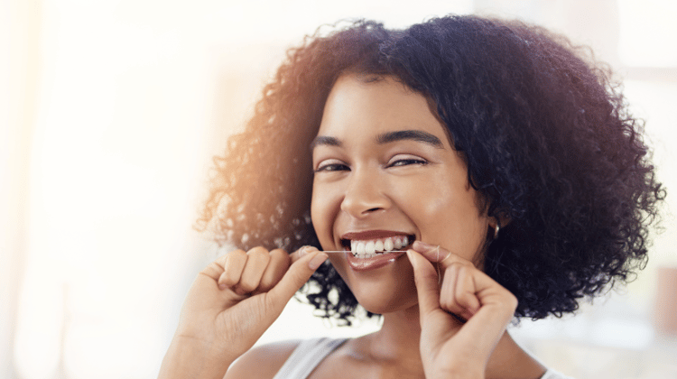 Woman flossing 