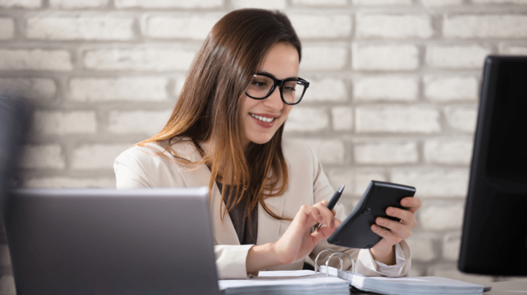 Woman Using Dental Accounting Software
