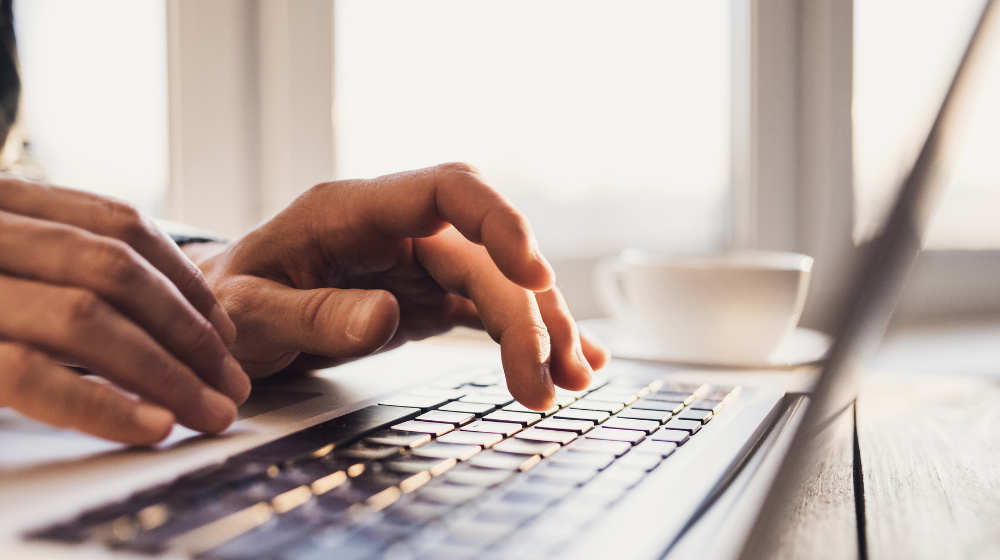 typing on a Mac computer