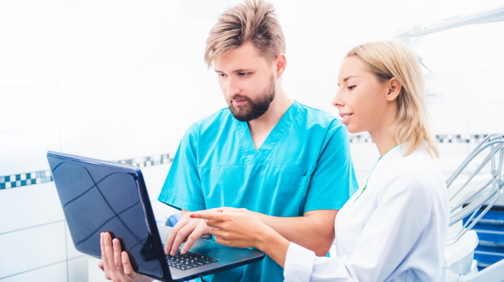 Dentists Working With Laptop
