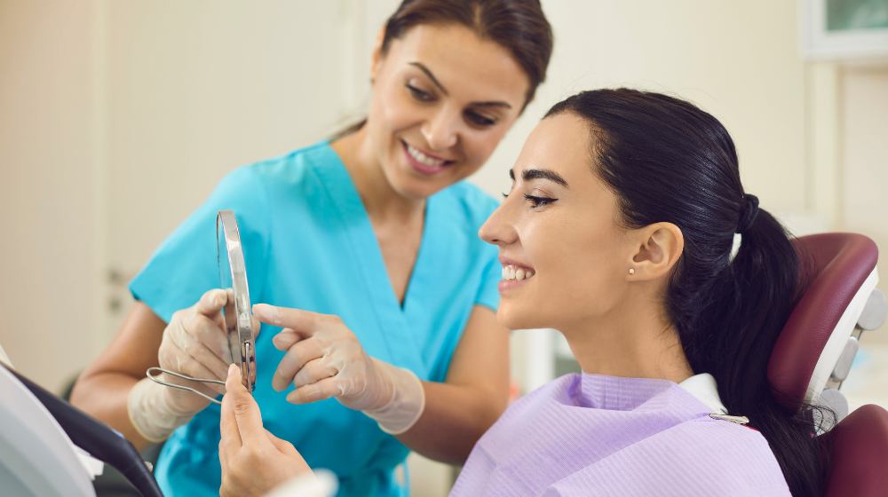 happy dentist and patient